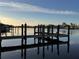 Private dock with water access, perfect for boating and enjoying waterfront living at 4010 Belle Vista Dr, St Pete Beach, FL 33706