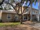 House exterior with white trim and landscaping at 4010 Belle Vista Dr, St Pete Beach, FL 33706