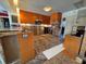 Kitchen with wood cabinets and granite counters being remodeled at 4010 Belle Vista Dr, St Pete Beach, FL 33706