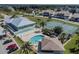 Community pool, tennis courts, and parking at 4650 Bay Blvd # 1046, Port Richey, FL 34668