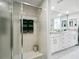 Shower stall with tiled walls and glass enclosure at 4650 Bay Blvd # 1046, Port Richey, FL 34668