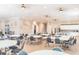 Community room with tables, chairs and kitchen at 4650 Bay Blvd # 1046, Port Richey, FL 34668