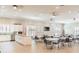 Community room with tables, chairs and kitchen at 4650 Bay Blvd # 1046, Port Richey, FL 34668