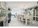 Bright dining room with table and chairs, offering water views at 4650 Bay Blvd # 1046, Port Richey, FL 34668