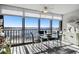 Condo dining area with glass table, offering beautiful water views at 4650 Bay Blvd # 1046, Port Richey, FL 34668