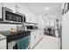Bright kitchen featuring stainless steel appliances and ample counter space at 4650 Bay Blvd # 1046, Port Richey, FL 34668