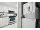 Galley kitchen with stainless steel appliances at 4650 Bay Blvd # 1046, Port Richey, FL 34668
