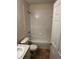 Bathroom with tiled shower/tub combo, toilet, and vanity at 6023 Osprey Lake Cir, Riverview, FL 33578