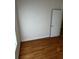 Empty bedroom with light wood-look flooring and white walls at 6023 Osprey Lake Cir, Riverview, FL 33578