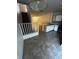 View from the kitchen into the dining and living area, with tile flooring at 6023 Osprey Lake Cir, Riverview, FL 33578