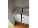 Convenient in-unit laundry room with white washer and dryer at 6023 Osprey Lake Cir, Riverview, FL 33578