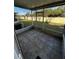 Screened porch with tiled flooring and view of backyard at 6023 Osprey Lake Cir, Riverview, FL 33578