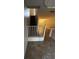 View of the staircase and entryway with tile flooring at 6023 Osprey Lake Cir, Riverview, FL 33578