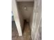 Small storage space under the stairs with tiled flooring at 6023 Osprey Lake Cir, Riverview, FL 33578