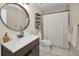 Clean bathroom with single vanity and shower/tub combo at 609 S Glen Ave # B, Tampa, FL 33609