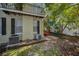 Building exterior with AC units and a small patio at 609 S Glen Ave # B, Tampa, FL 33609
