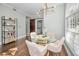 Small dining area with glass top table and modern chairs at 609 S Glen Ave # B, Tampa, FL 33609
