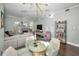 Dining area with glass-top table, and view of living room at 609 S Glen Ave # B, Tampa, FL 33609