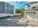 Building exterior showing garage and stairs at 609 S Glen Ave # B, Tampa, FL 33609