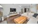 Bright living room with sectional sofa and wood coffee table at 609 S Glen Ave # B, Tampa, FL 33609