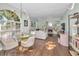 Bright living room features hardwood floors, a fireplace, and ample natural light at 609 S Glen Ave # B, Tampa, FL 33609