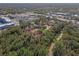 Aerial perspective showcasing the property's setting in a tranquil community at 705 Loma Linda Ct, Brandon, FL 33511