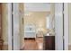 Elegant bedroom with hardwood floors and a white post bed at 705 Loma Linda Ct, Brandon, FL 33511