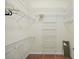 Large walk-in closet with wire shelving and hanging rods at 705 Loma Linda Ct, Brandon, FL 33511