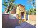 Stone and brick outdoor fireplace for cozy evenings at 7521 Coventry Dr, Port Richey, FL 34668
