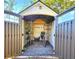 Organized storage shed with shelving and bike at 7521 Coventry Dr, Port Richey, FL 34668