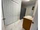 Updated bathroom with walk-in shower and double closet at 8601 Twin Lakes Blvd, Tampa, FL 33614