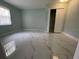 Spacious bedroom with marble-look floors and large closet at 8601 Twin Lakes Blvd, Tampa, FL 33614
