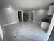 Open kitchen with white cabinets and marble-look floors at 8601 Twin Lakes Blvd, Tampa, FL 33614