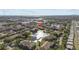 Drone shot of the property showcasing lakes and residential building at 10265 Gandy N Blvd # 905, St Petersburg, FL 33702