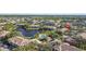 Aerial view of condo building near lake and community at 10265 Gandy N Blvd # 905, St Petersburg, FL 33702
