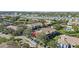 Aerial view of a property with a marked location and surrounding community amenities at 10265 Gandy N Blvd # 905, St Petersburg, FL 33702