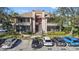 Exterior view of condo building with parking at 10265 Gandy N Blvd # 905, St Petersburg, FL 33702