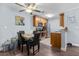 Open kitchen with wood cabinets, granite counters, and stainless steel appliances at 10265 Gandy N Blvd # 905, St Petersburg, FL 33702