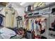 Spacious walk-in closet with ample hanging space and shelving at 10265 Gandy N Blvd # 905, St Petersburg, FL 33702