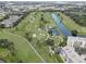Aerial view showing golf course and condo buildings at 1200 Country Club Dr # 2504, Largo, FL 33771