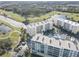 Aerial view of condo community with surrounding golf course at 1200 Country Club Dr # 2504, Largo, FL 33771