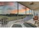 Balcony with sunset view over golf course and pond at 1200 Country Club Dr # 2504, Largo, FL 33771