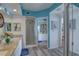Spa-like bathroom with granite countertops, double sinks, and walk-in shower at 1200 Country Club Dr # 2504, Largo, FL 33771