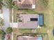 Overhead view of house, pool, and driveway, ideal for showcasing property layout at 1515 Lions Club Dr, Brandon, FL 33511