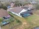 Aerial view of the property highlighting the expansive backyard and screened-in pool area at 1515 Lions Club Dr, Brandon, FL 33511