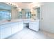 Bathroom vanity with double sinks, ample counter space, and bright lighting at 1515 Lions Club Dr, Brandon, FL 33511