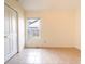 Bedroom with tile flooring and a window overlooking the backyard at 1515 Lions Club Dr, Brandon, FL 33511