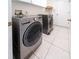 Laundry room with modern washer and dryer units at 1515 Lions Club Dr, Brandon, FL 33511