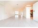 Bright and airy living room featuring neutral walls and tile flooring throughout at 1515 Lions Club Dr, Brandon, FL 33511