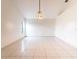 Large living room featuring tile floors and ample natural light at 1515 Lions Club Dr, Brandon, FL 33511